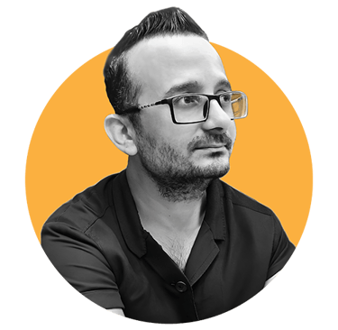Portrait of Hosam Shokair, a professional Art Director and Graphic Designer, in a circular orange