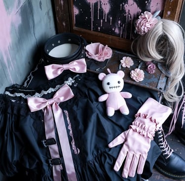 pastel goth weirdcore doll on a table