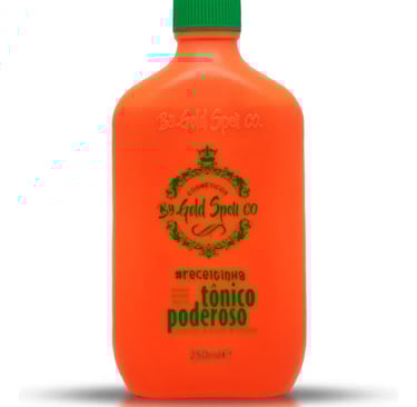 Orange bottle of Gold Spell Co Tônico Poderoso hair growth tonic with a green spray nozzle.