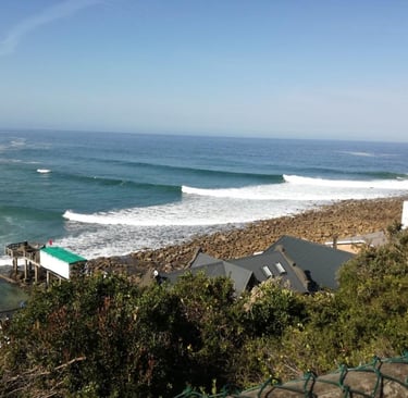 a view of a beach with a view of the ocean
