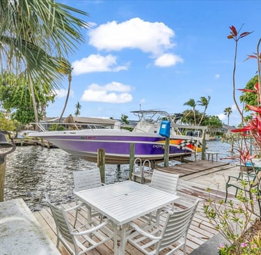 Boat lifted on a dock in Cape Coral