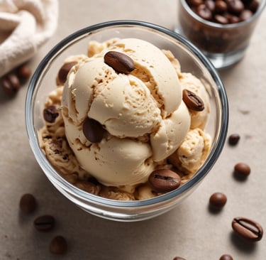 Coffee-flavored ice cream in a glass bowl with coffee beans around