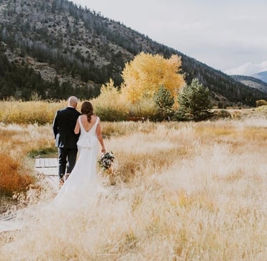 couple with mountain views in the fall