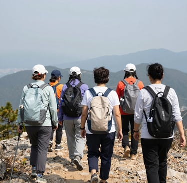 A candid shot of lezfinity members laughing around a cozy bonfire at dusk.