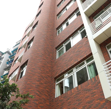 Bestone Materials flexible facing brick installation, red textured MCM brick veneer on exterior wall