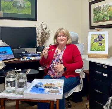 Sylvia McConnell painting in her office