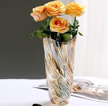 Crystal figurine with gold rose detailing, decorative luxury ornament for gifting and display.