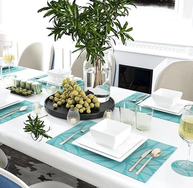 Set of beaded hand-crafted charger mats in warm neutral tones, luxury table setting accents.