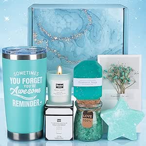 Blue spa bath gift set with bath salts and self-care products, soothing relaxation kit.