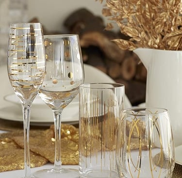 Elegant crystal glass set with gold detailing, luxury drinkware for stylish dining.
