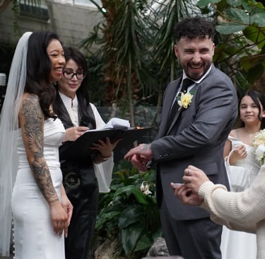 Wedding couple laughing at Bloedel Conservatory in Vancouver,BC