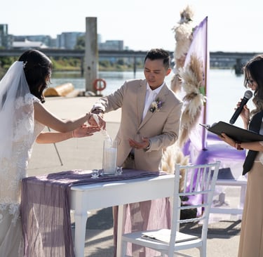 sunny day wedding couple lighting candle 