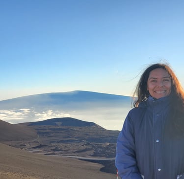 Crystal on Mauna Kea with Mauna Loa