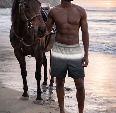 Doog Walker swim trunks with gradient ocean design worn on a beach at sunset, coastal fashion lifestyle