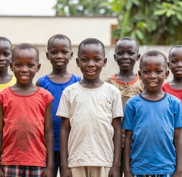 Warm, uplifting photo of African children engaged in a joyful learning activity outdoors.