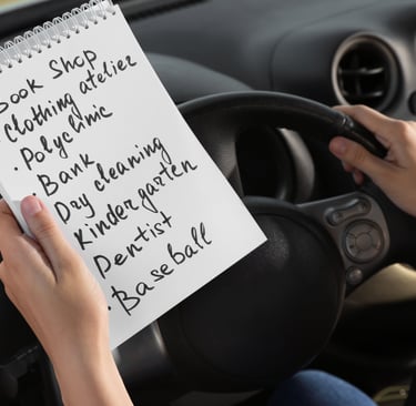 a person holding a notepad with a notepad on it