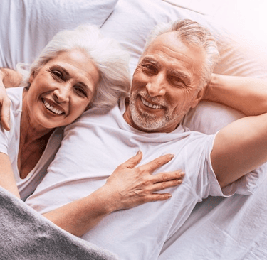 Couple Cuddling in bed