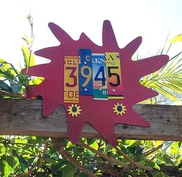 Red splatter-shaped home address marker with numbers 3945.