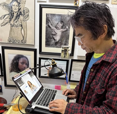 Photographer Kenji Fukudome working on images from photo shoot with Tal Avitzur.