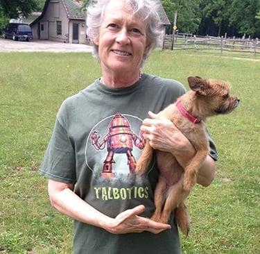 Talbotics t-shirt wearer with dog in Michigan.