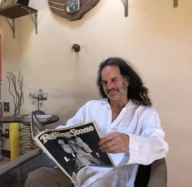 Artist Tal Avitzur in home gallery.