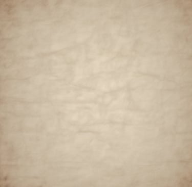 Jar of creamy beef tallow balm surrounded by fresh natural ingredients on a wooden table.