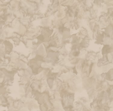 Close-up of a smiling woman gently touching her glowing skin outdoors.