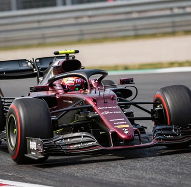 A sophisticated, high-speed action shot of a Formula One car mid-corner, focusing on the shimmering deep red and dark gray carbon fiber bodywork under bright stadium lights. The composition is dynamic with a shallow depth of field, highlighting the precision of the front wing. North American / US motorsport setting.