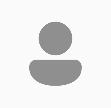 Generic gray person profile icon avatar on a white background for user interface design.