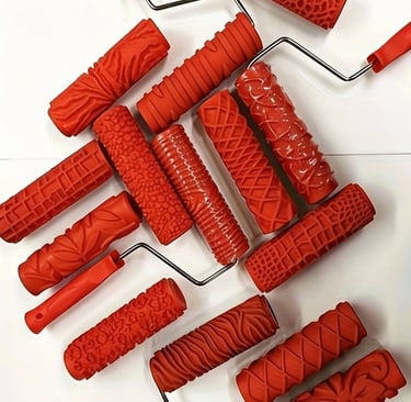 a bunch of red texture paint rollers 