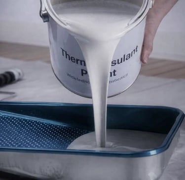 a person pouring paint into a container with a bucket