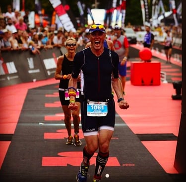 James Oswald finishing Ironman Vichy in HUUB trisuit