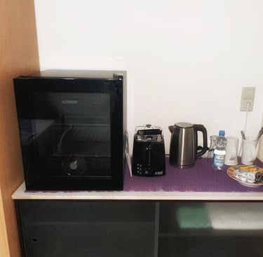 Wasserkocher, Toaster und kleine Ausstattung im Gästezimmer