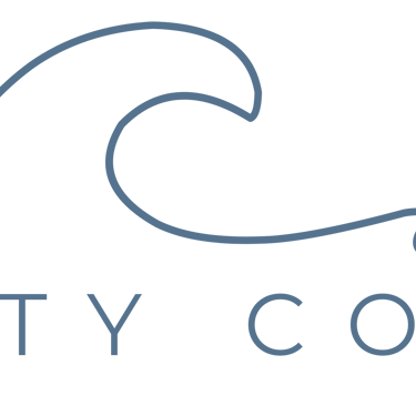 Minimalist Salty Coast logo featuring a blue ocean wave line art design above the brand name.