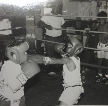 Roger "Vargas" Romo against Matthew Doucette. You can see Fernando left cheering on his kid brother