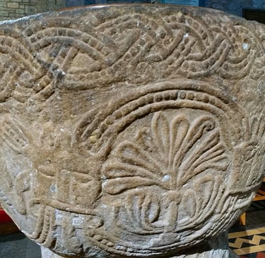 Another side of the baptismal font at the Brecon Church showing a tree of life.