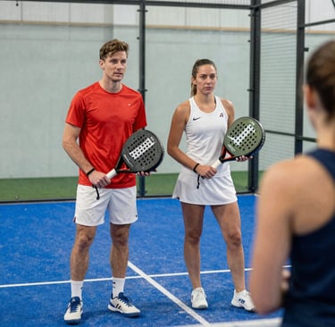 Indoor padel court with padel players