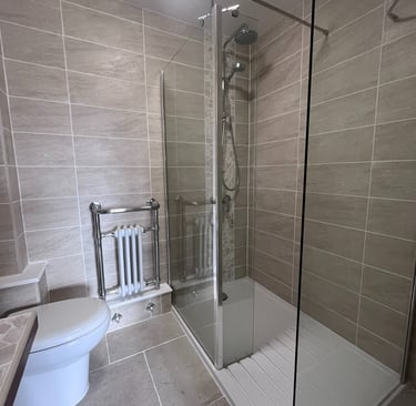 recently renovated bathroom with walk-in shower