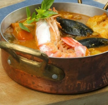 Marseille food specialties bouillabaisse and local cuisine at seaside restaurant