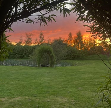 Arches by the pond at sunset