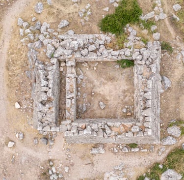 Aerial view of the ancient stone ruins of the Pyramid of Hellinikon in Argos, Greece.