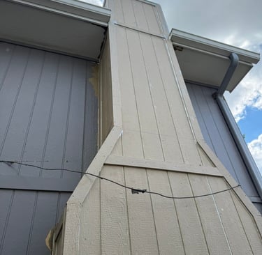 Close-up of a vinyl siding patch repair in Omaha, NE, showing a seamless color match on a residentia
