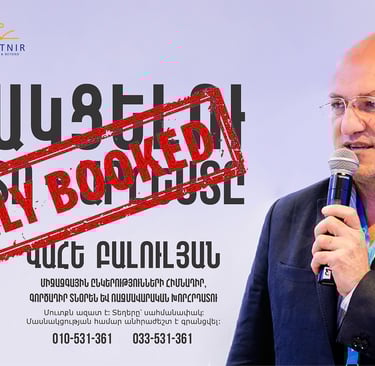 Professional speaker at an Advise Armenia event with a Fully Booked red stamp overlay.