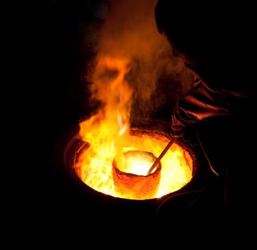 Pouring molten bronze Naughty Boy studio