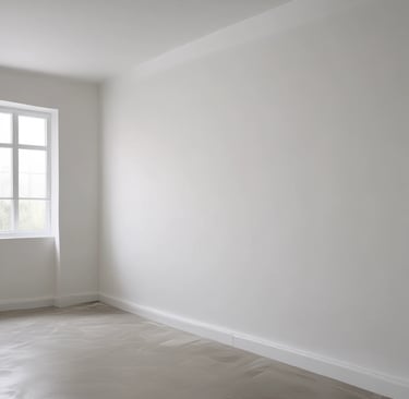 Close-up of a craftsman applying drywall in a residential renovation project.