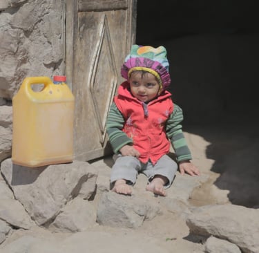 Muhamasheen child in house made of rocks