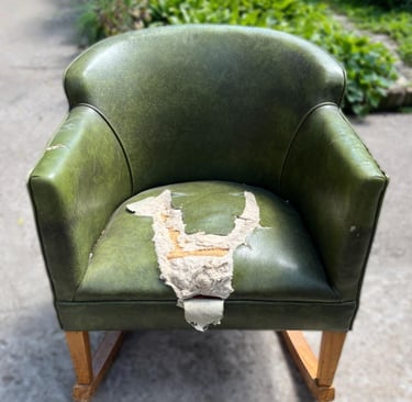 green vinyl rocking chair before reupholstery