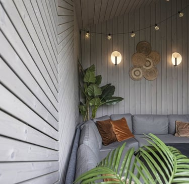 a couch with a couch and some plants