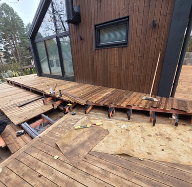 a man is fixing a deck deck with a deck