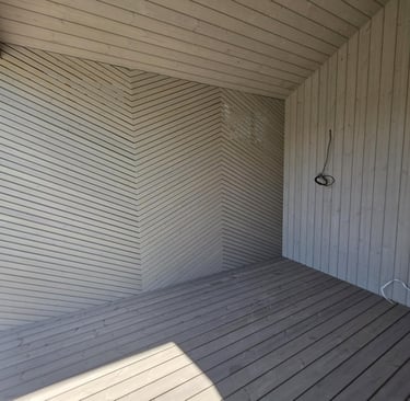 a room with a white brick wall and a white brick wall